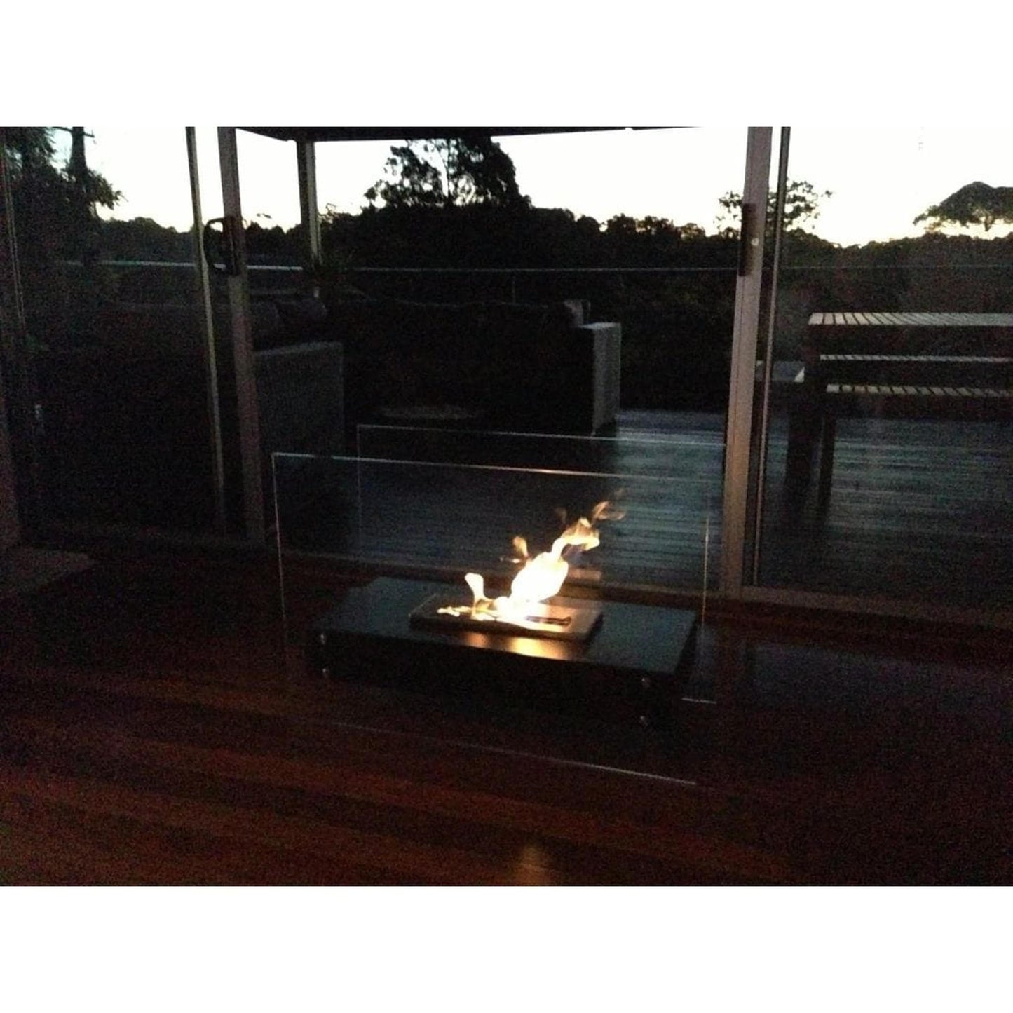 The Bio Flame 35" Evoque Freestanding See-Through Ethanol Fireplace