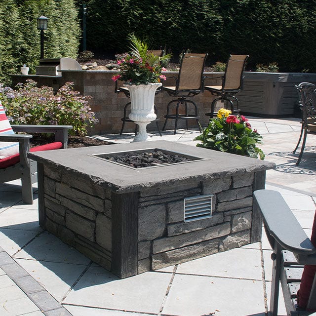 Nicolock 44" Encore Square Stainless Steel Smokeless 2 Fire Pit Package with Surround in Ledgestone Texture & Biscotti Tan Color