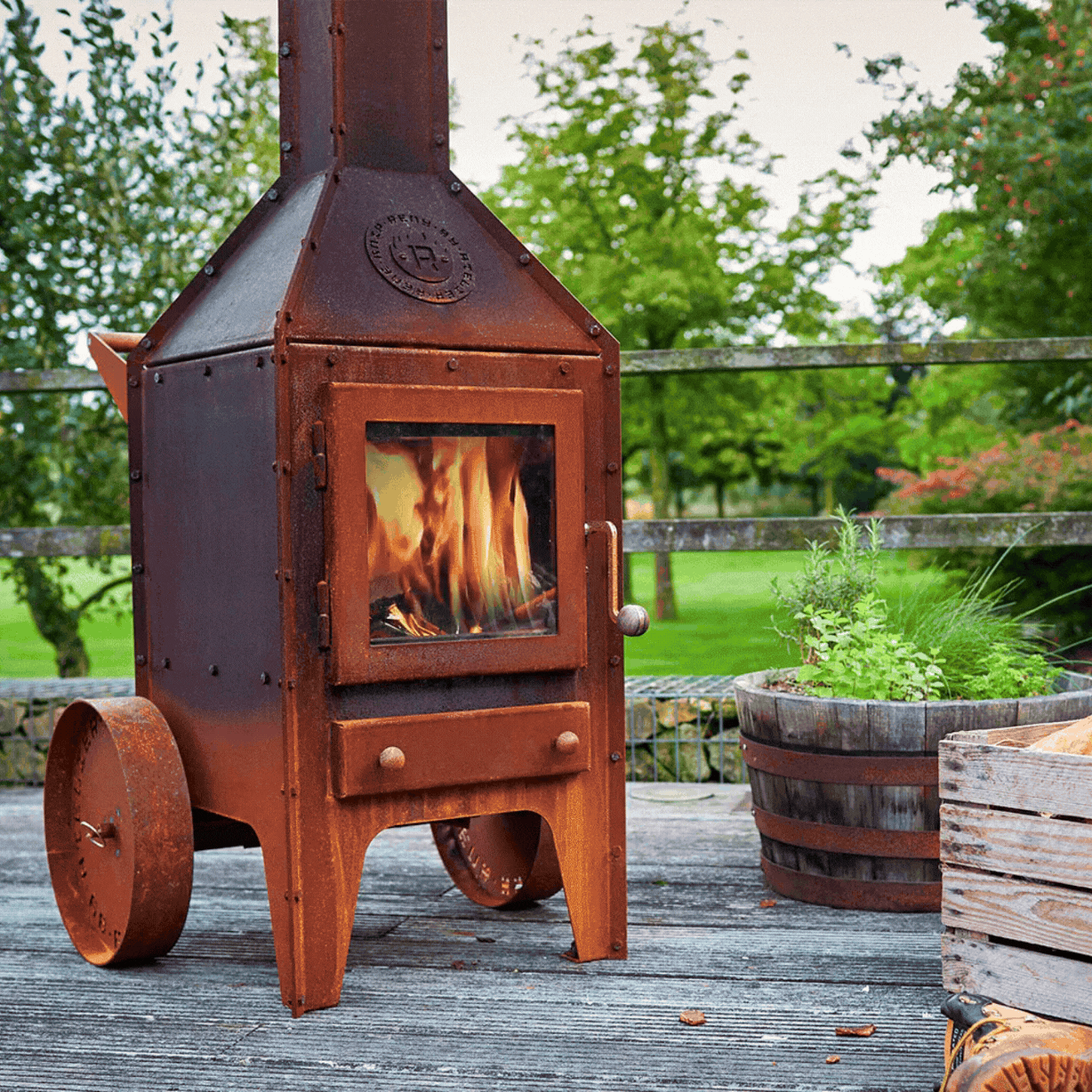 RB73 Bijuga 3mm CorTen Steel Fireplace With Two Wheels and a Push Bar