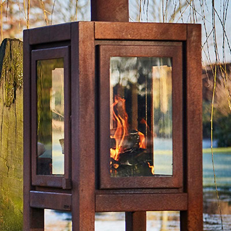 RB73 Quaruba XXL MOBILE 4-Sided Glass Warm Brown CorTen Steel Wood-Burning Outdoor Fireplace